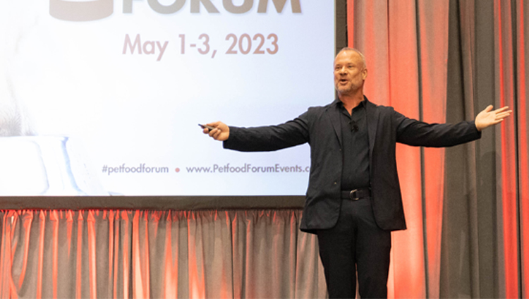 David Allison on stage speaking at Petfood Forum