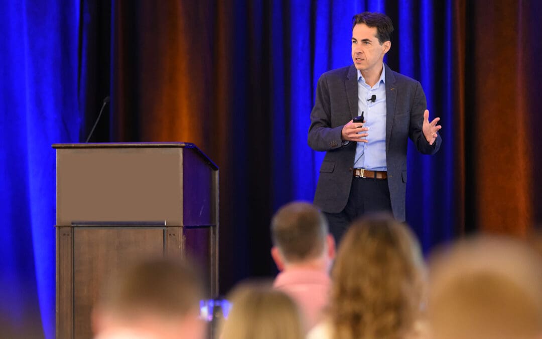 Keynote speaker Kevin Ryan speaking on stage