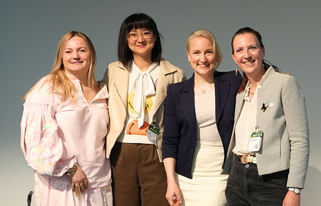 Four women smile for a photo at Women in Petfood Leadership during Interzoo 2026